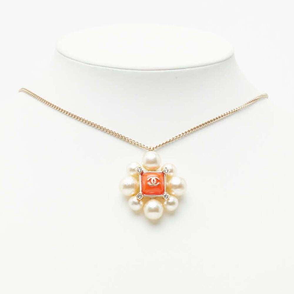 CHANEL Orange Pearl Logo Necklace - Picture 7 of 7